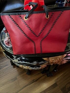 Red Leather Tote with Black Trim and Decorative Stitching